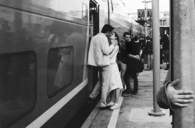 couple kiss goodbye